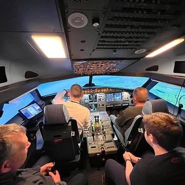 Crew operating the simulator with external visuals