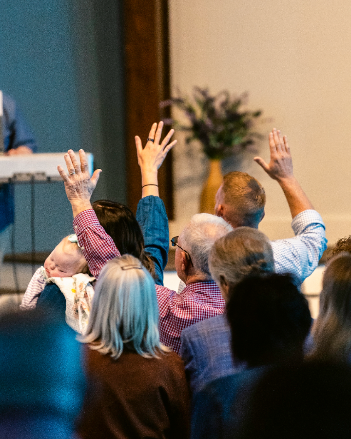 The congregation worshipping together in the sanctuary at Abundant Life Church