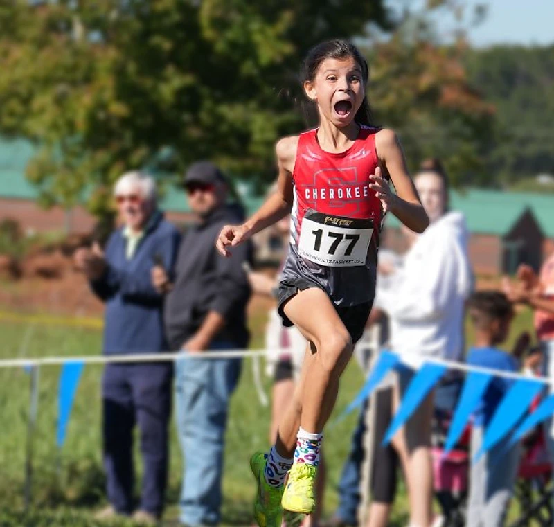 Cherokee Junior Warriors runner mid-race