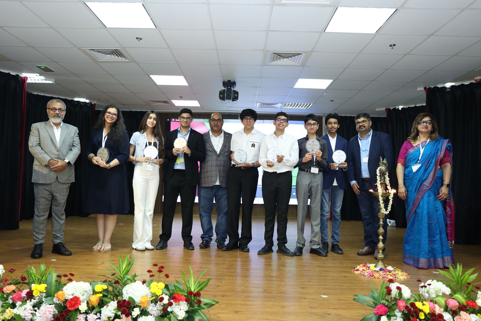 Awardees and guests on stage at the International Literacy Day 2025 ceremony