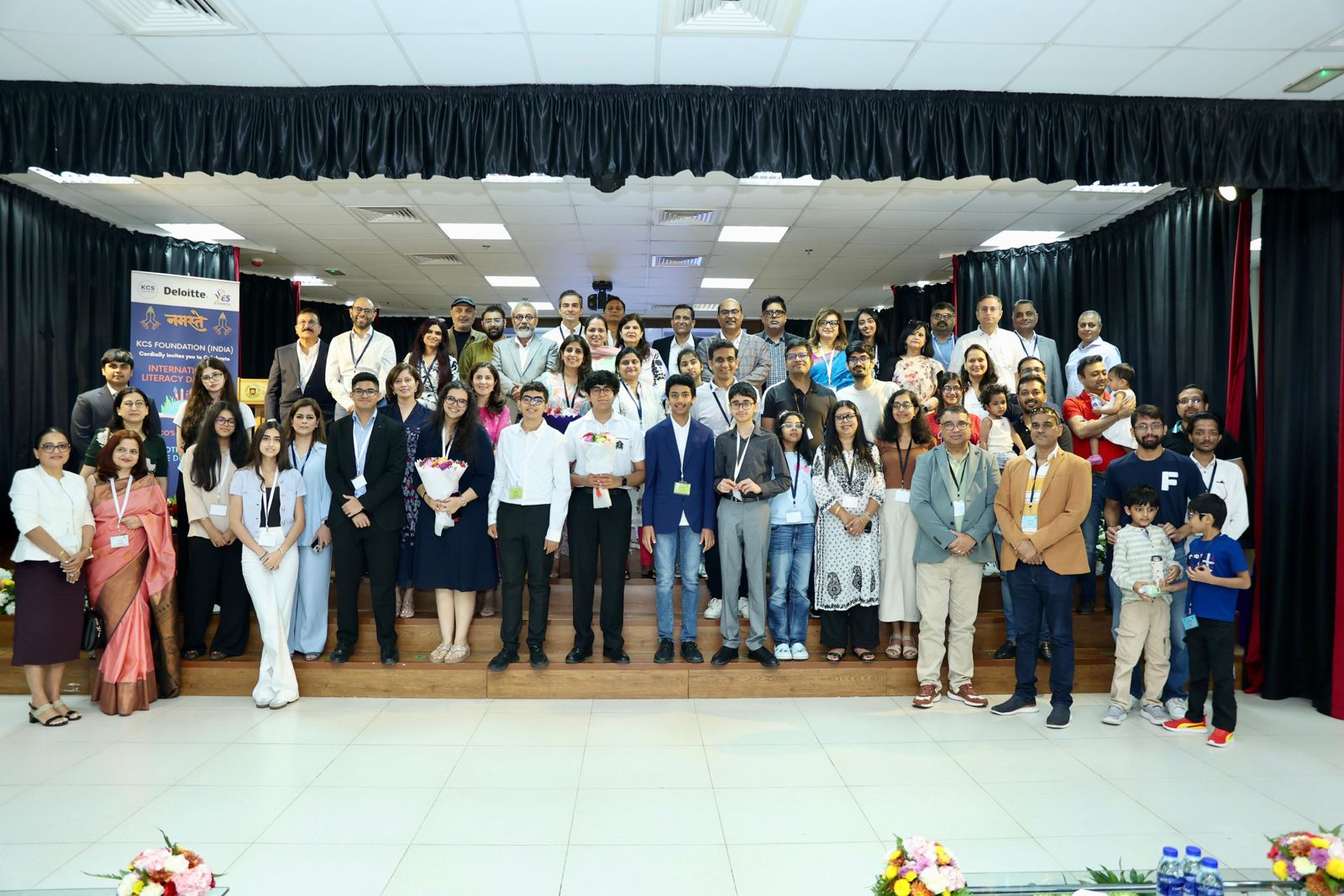 Group photograph of guests and students at the International Literacy Day 2025 celebration