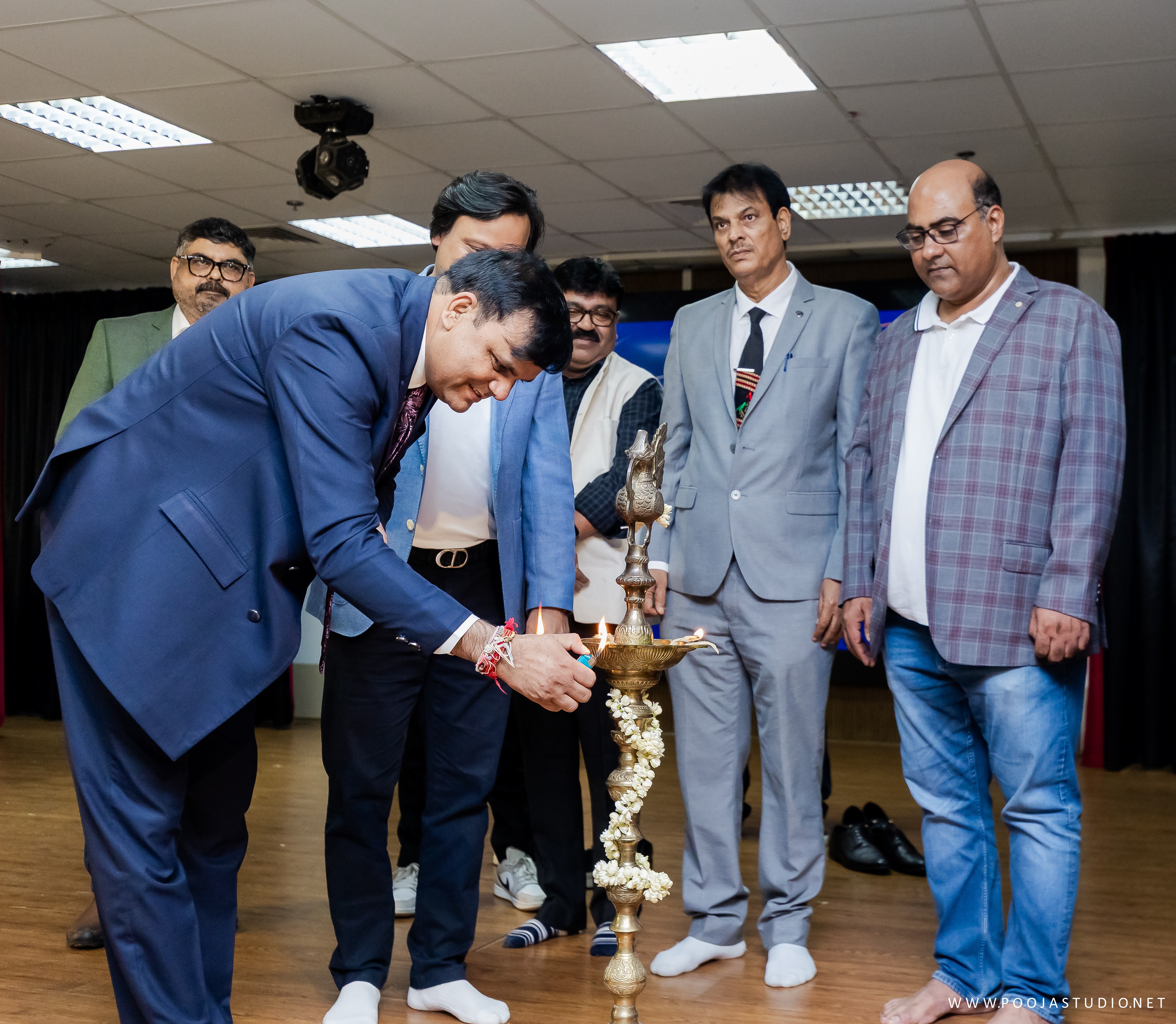 Lighting the ceremonial diya