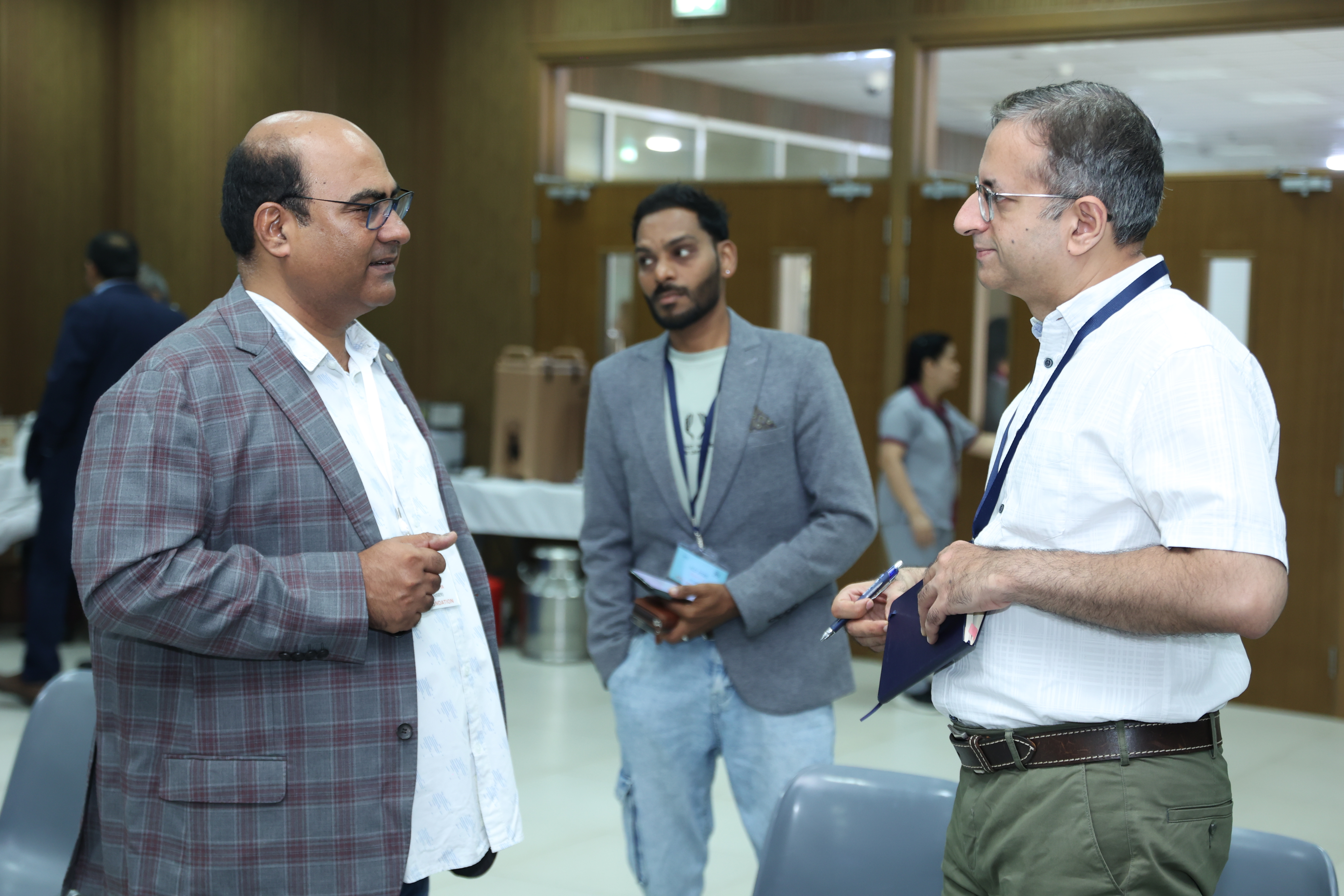 Guests in conversation at the International Literacy Day 2025 celebration