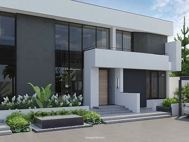 R.E Villa in Baghdad with crisp white and charcoal architecture, large windows, landscaped entrance and layered green planting
