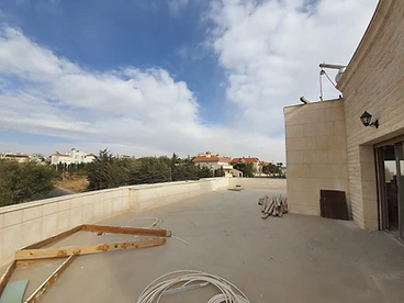 Before: roof, roof terrace design, Amman: bare concrete roof, timber offcuts and cables