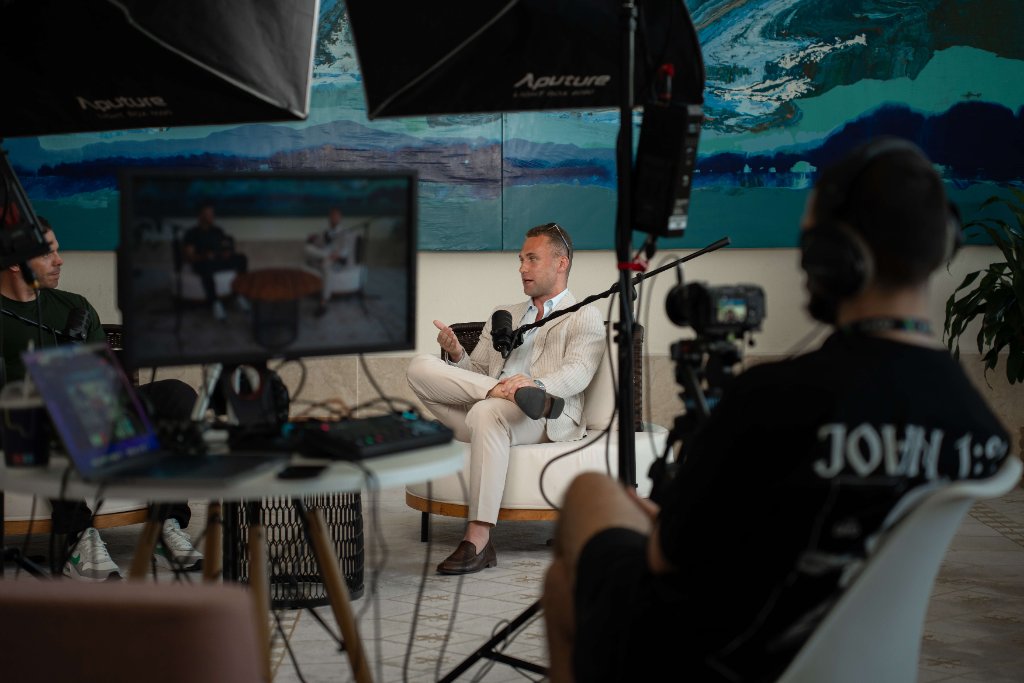 James Demetriades recording a podcast interview