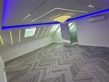 Completed Loft Room in London by Harris Construction