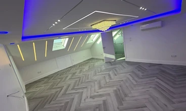 Completed Loft Room in London by Harris Construction