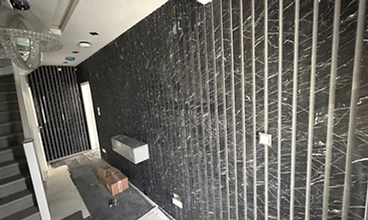 Black Marble Feature Wall in London by Harris Construction