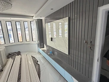 Media Wall Unit in London by Harris Construction