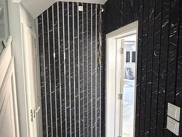 Marble Feature Hallway in London by Harris Construction