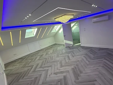 Finished Loft with LED Lighting in London by Harris Construction