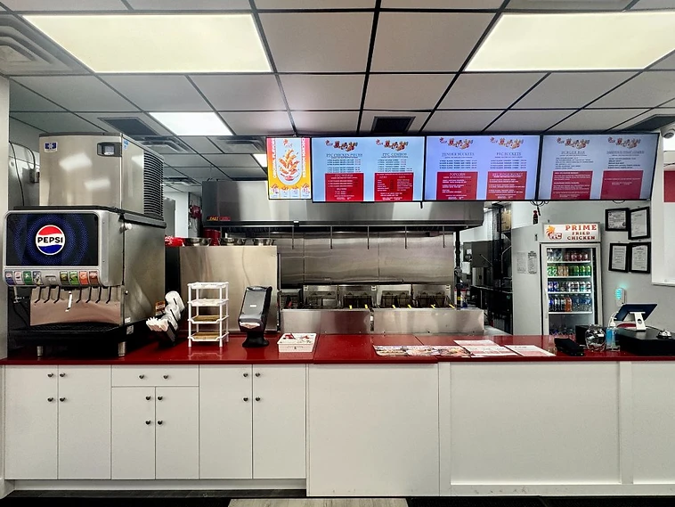 Prime Fried Chicken service counter and kitchen in Camrose