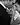 Full wedding ceremony photography in Sydney — a groom kissing his bride’s hand in a close-up black and white portrait