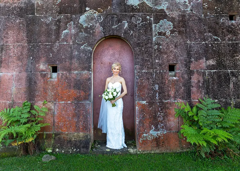 Irena and Petar sharing a romantic moment at their scenic Gunners Barracks harbourfront wedding in Sydney