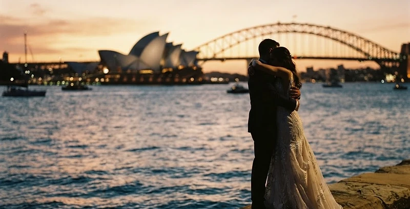 Cinematic Sydney Harbour wedding at golden hour — view the full Dreams Photography portfolio