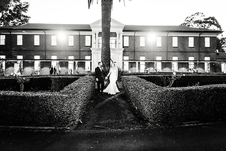 Tahnee and Lachlan celebrating their love on the lawn of the historic Cropley House wedding venue