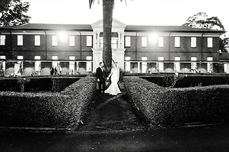 Tahnee and Lachlan celebrating their love on the lawn of the historic Cropley House wedding venue