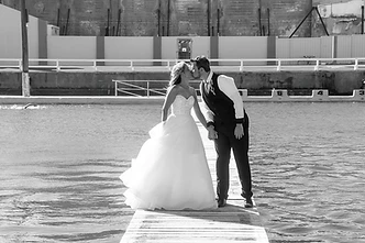 Bree and Brendon posing together during their stunning Newcastle wedding photography session by Dreams Photography