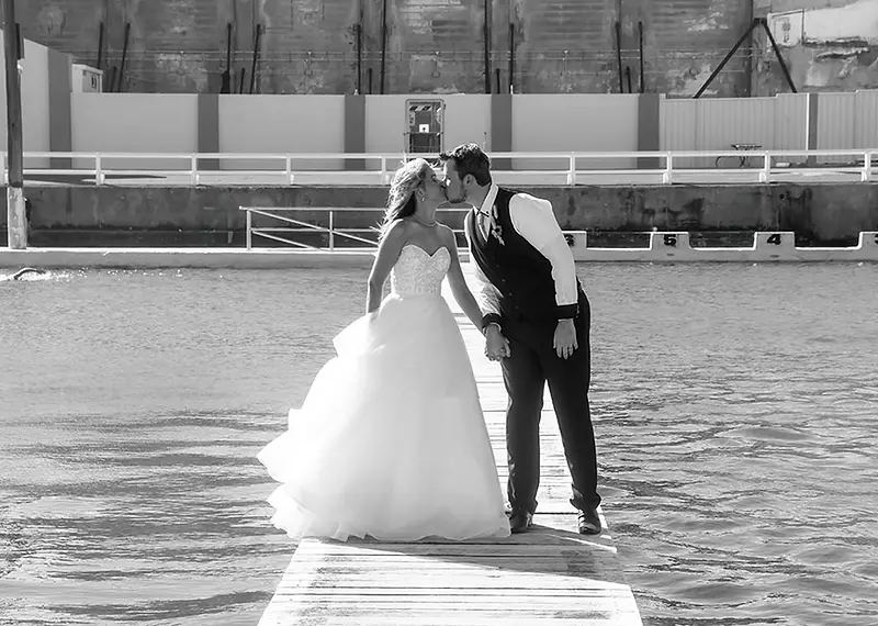 Bree and Brendon posing together during their stunning Newcastle wedding photography session by Dreams Photography