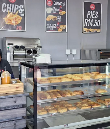 Hot food counter with pies, chips and combos
