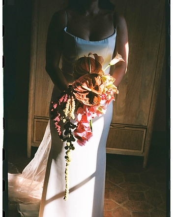 Bride with a cascading anthurium and orchid bouquet
