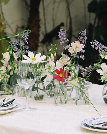 Overhead bud vase detail with pink scabiosa and foxglove