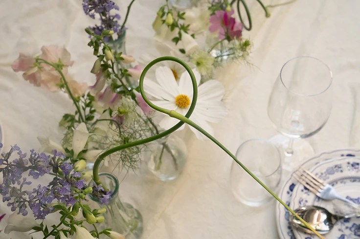 Floral table arrangement with cosmos and lavender