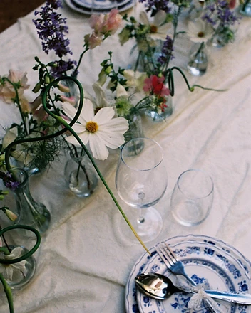 Aerial overhead of full table with wildflower arrangement