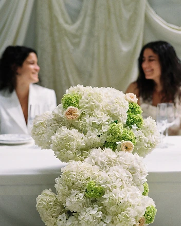 Full sweetheart table with white hydrangea and silver candelabra