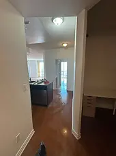 Repainted condo hallway and kitchen after tenant turnover in Toronto