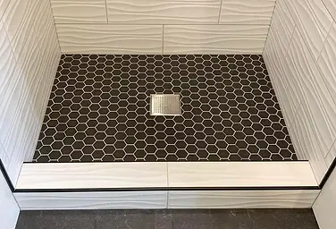 Finished black mosaic shower floor and drain by 416Fix