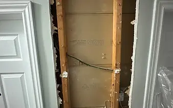 Why Drywall Cracks and Nail Pops Show Up When the Heat Comes On