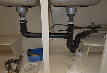 Double-sink drain installation completed by 416Fix