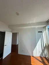 Rent-ready condo bedroom with closet and fresh walls
