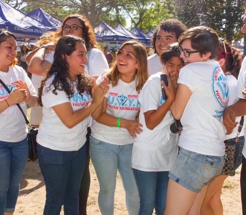 UWYF youth celebrating together at a community event