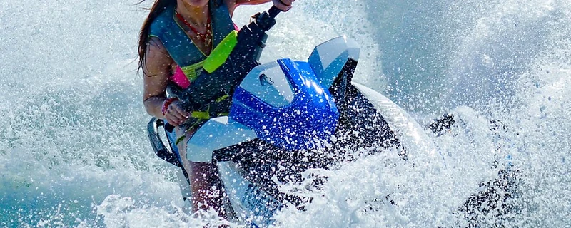 Jet ski riders approaching Honeymoon Island on the Gulf of Mexico