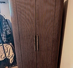 Dark ribbed wardrobe cabinet