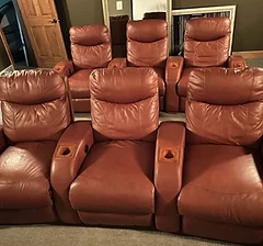 Set of leather home theater recliner seats