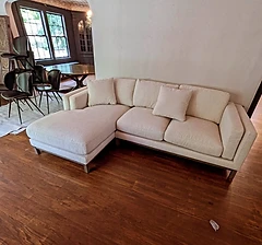 Modern cream sectional with chaise in a beautiful home