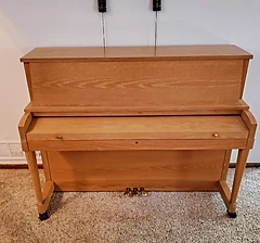 Upright piano delivered