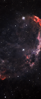 The Crescent Nebula, an arc of glowing ionised gas