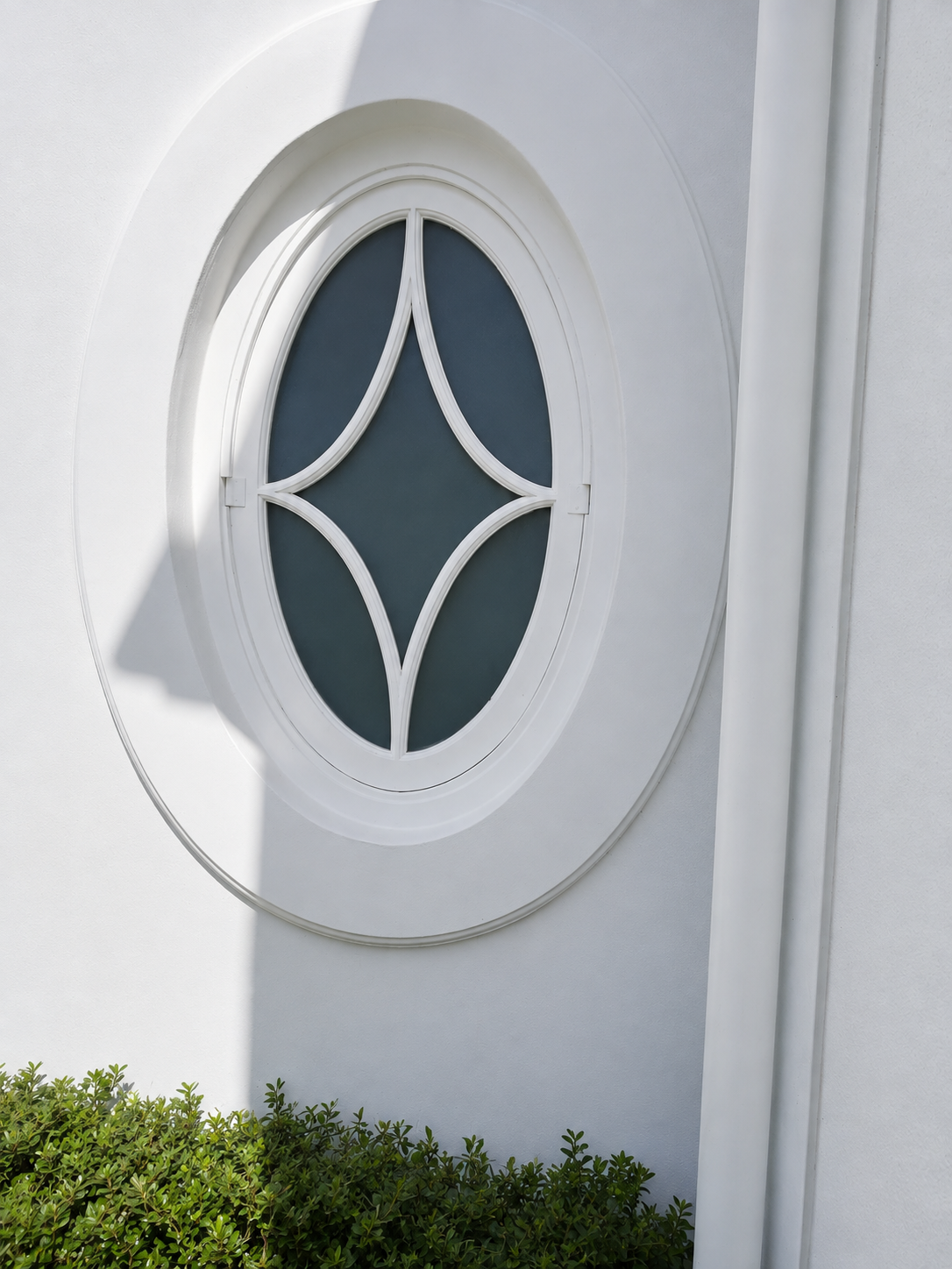 Oval Pivot Window