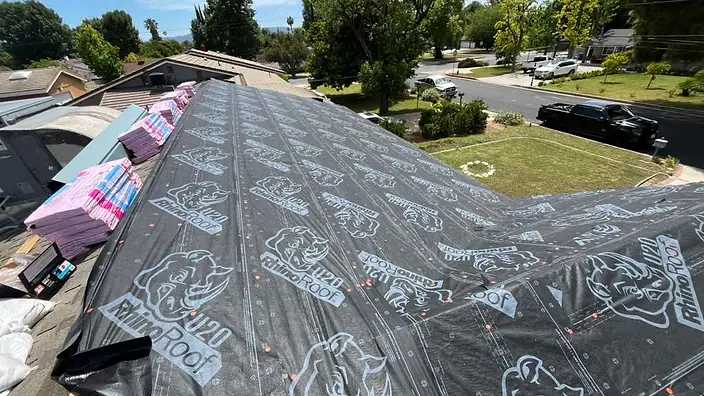 RhinoRoof underlayment fully installed on hip roof