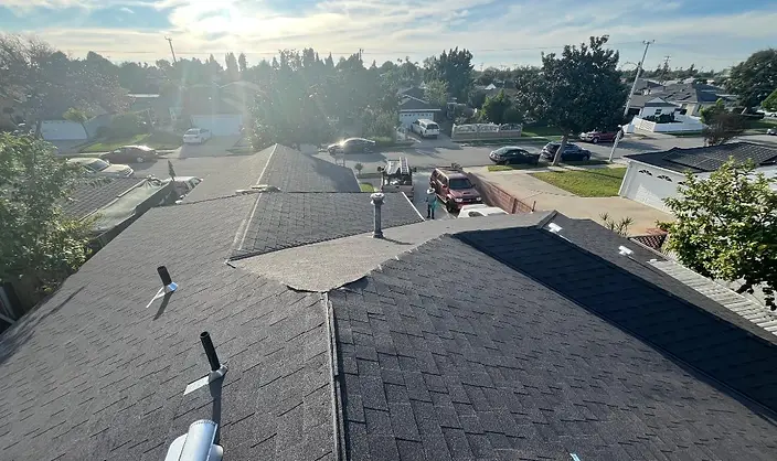 Completed charcoal architectural shingle roof