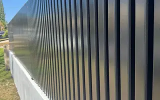 Charcoal vertical slat fence completed in Hollywood