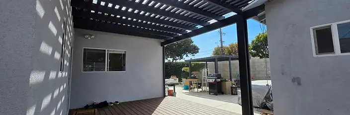 Ground-Level Composite Deck with Aluminum Pergola — Culver City in Culver City, California