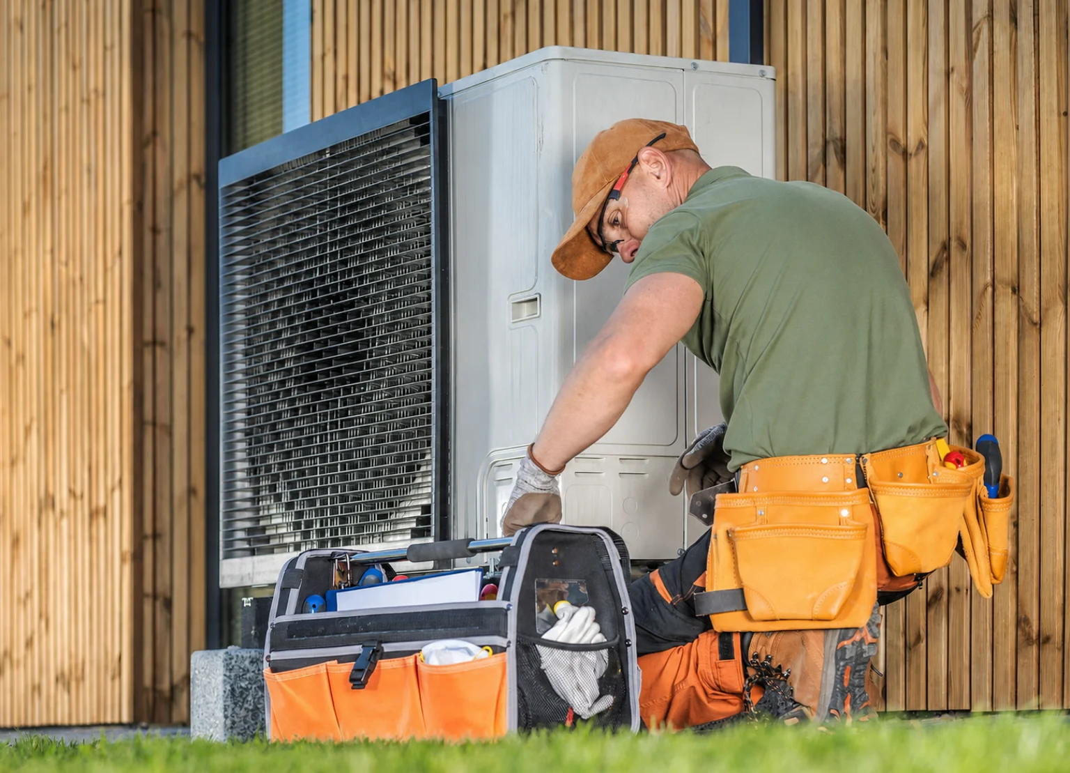 Spoor's HVAC technician repairing a residential comfort system in Auburn
