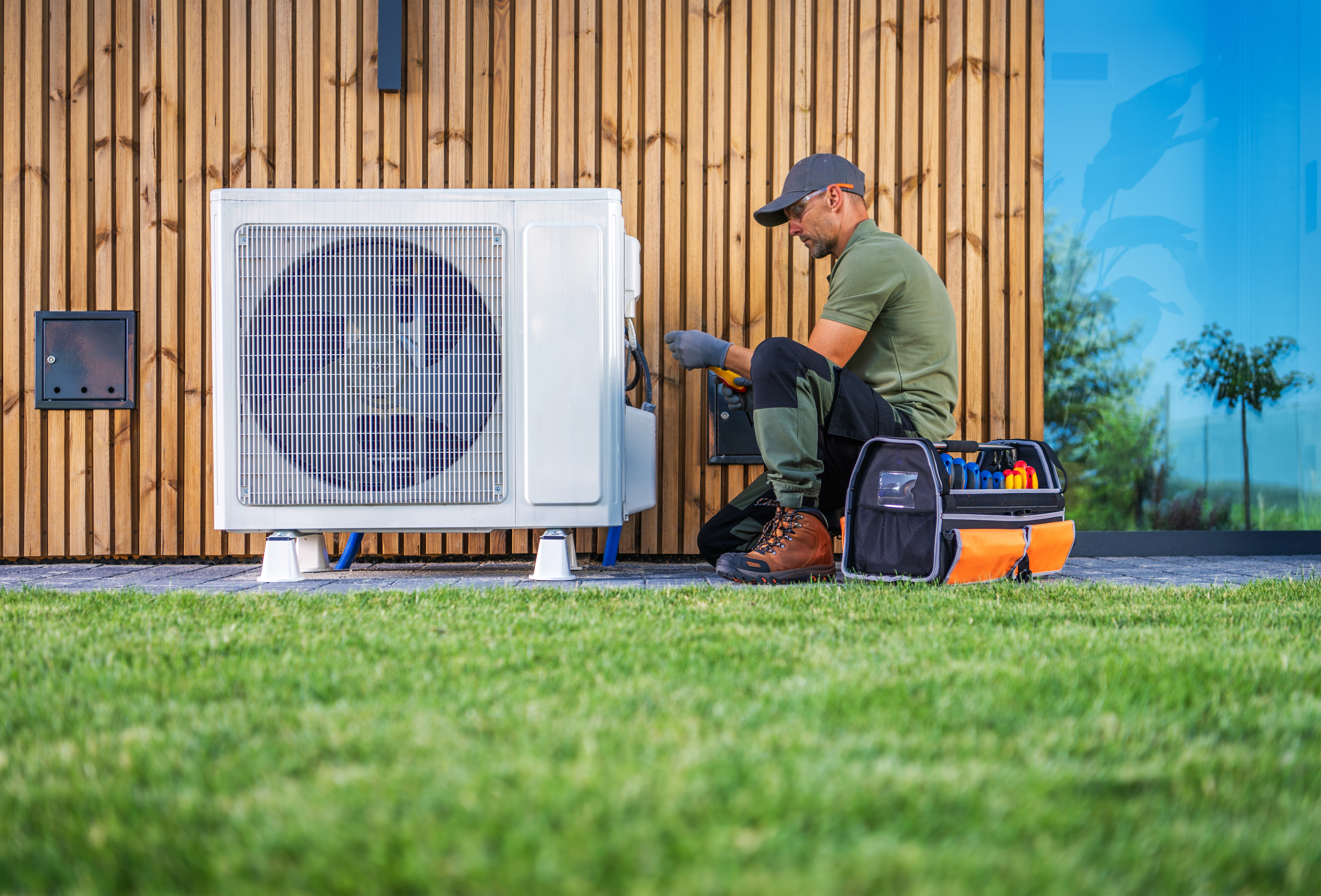 Spoor's technician servicing a residential heat pump in Auburn, California