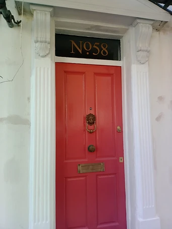 No. 58 entrance — period door surround and pilasters after preparation